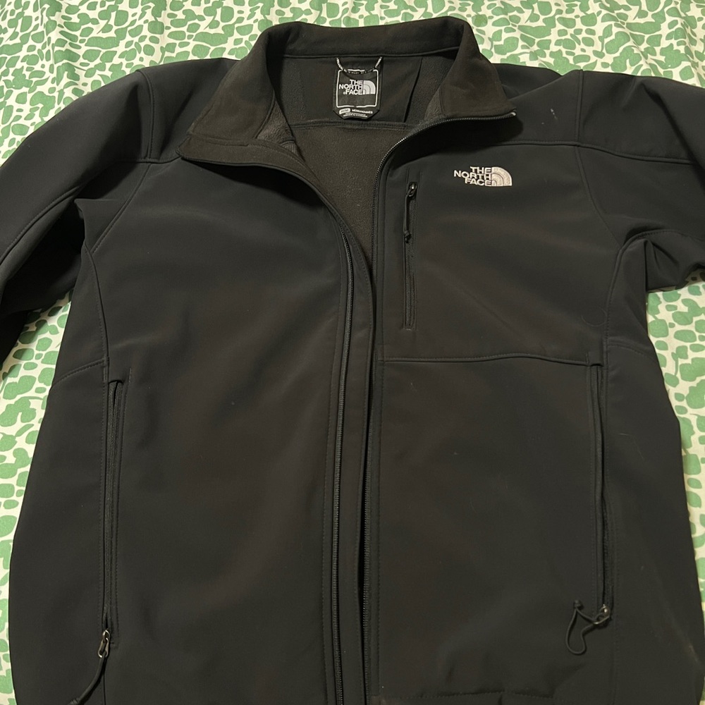 The North Face black lightweight zip up jacket, worn once.